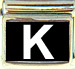 White Block Letter K with Black Background